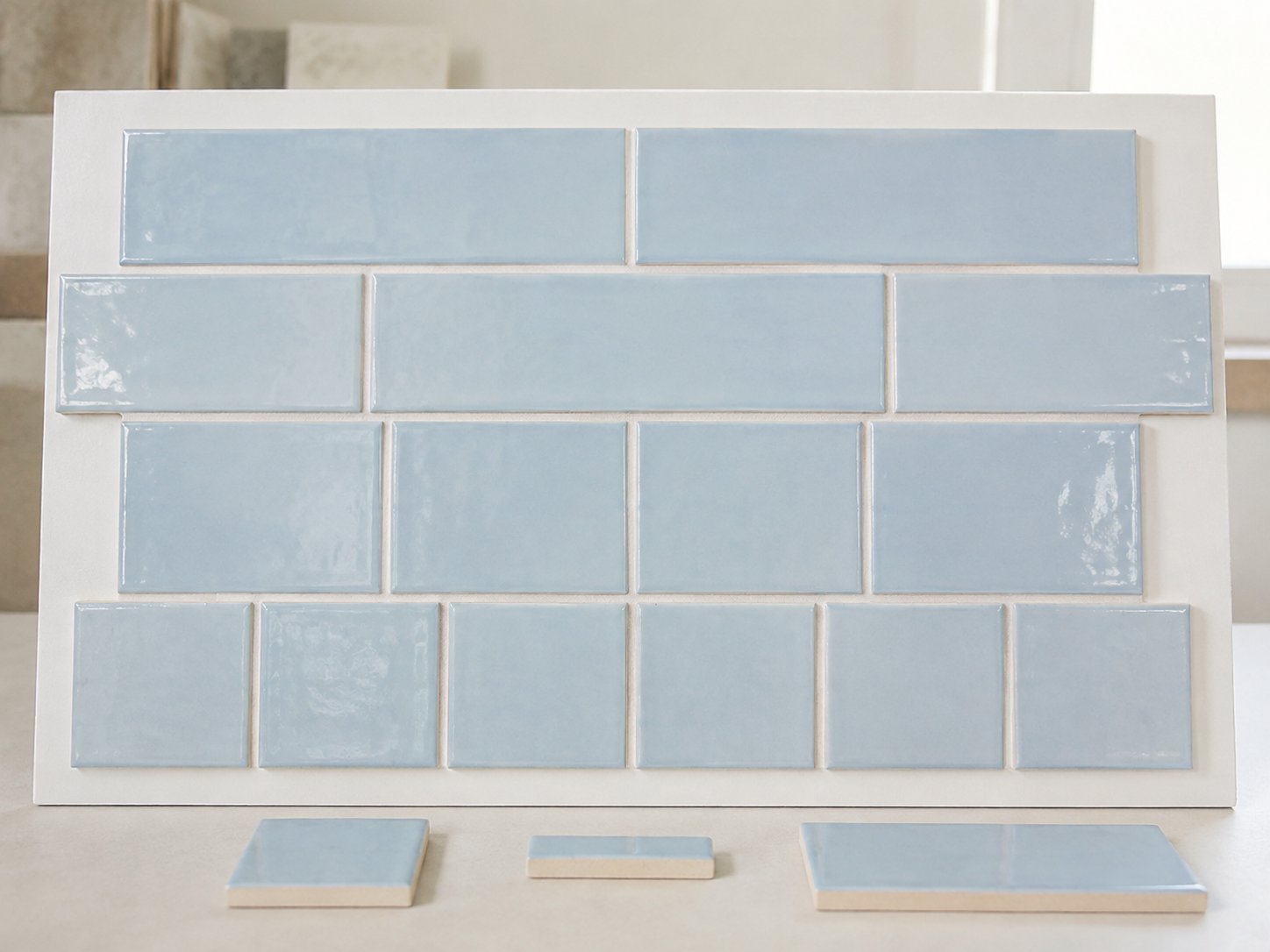 Light blue subway tiles in coordinated rectangular formats